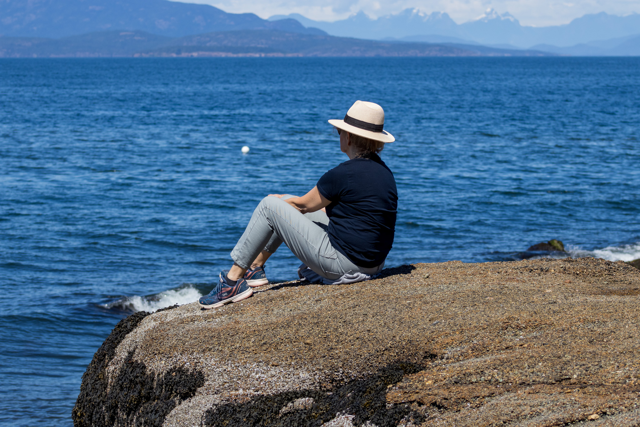 This image sets the emotional tone: contemplative, spacious, grounded in the body’s relationship to the horizon.